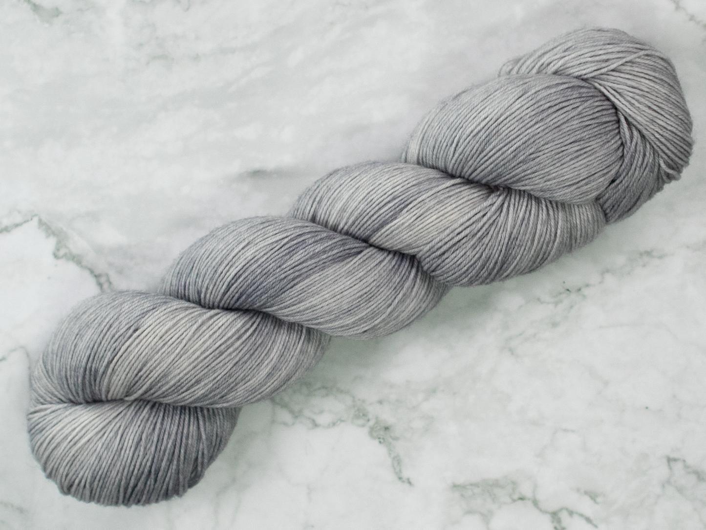 Photo of Fingering Weight yarn in "Mithril"