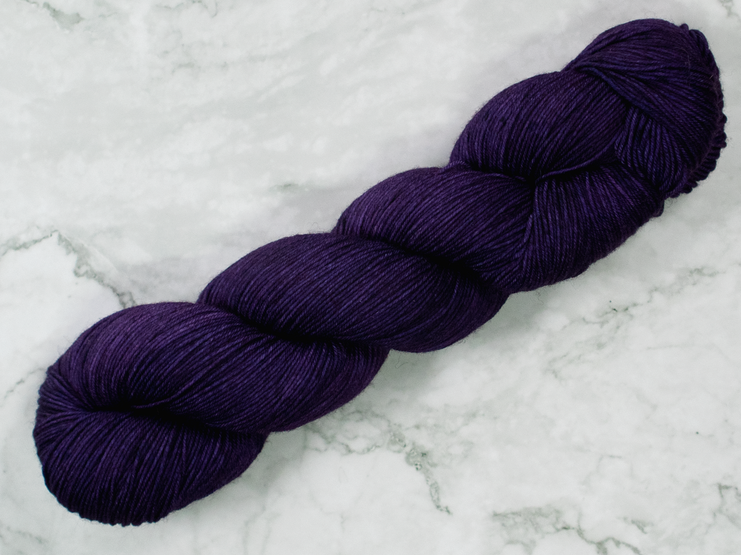Photo of Fingering Weight yarn in "Nurple"
