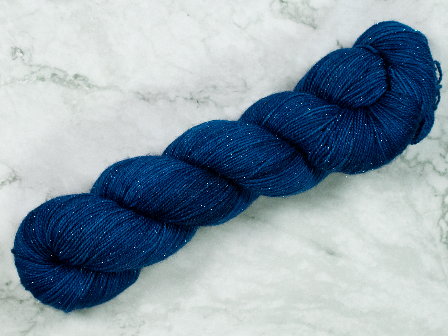 Photo of Fingering Weight Glitter yarn in "Coraline"