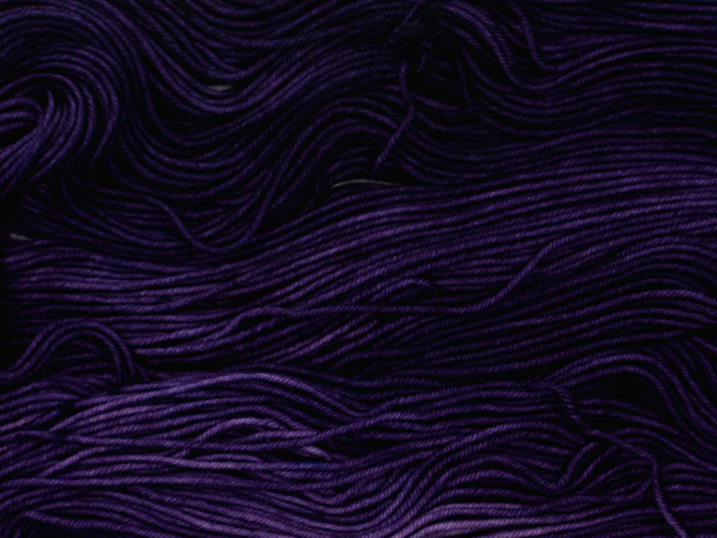 Photo of DK Weight yarn in "Nurple"