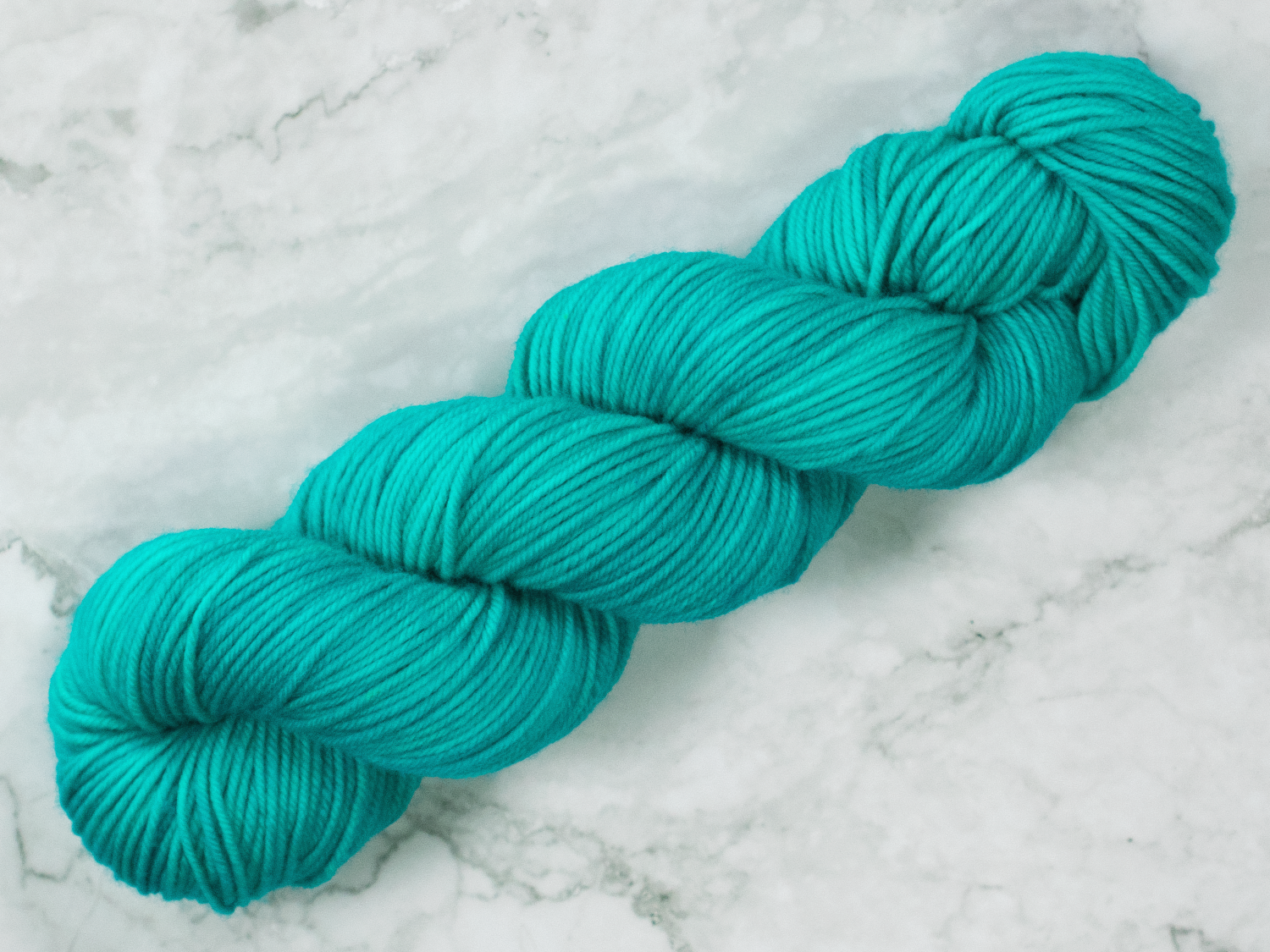 Photo of DK Weight yarn in "As Cold As Ice"