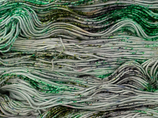 Photo of DK Weight yarn in "Buttons & Bravery"