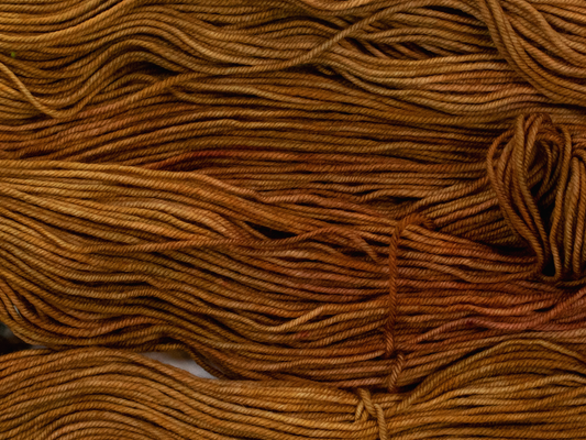 Photo of DK Weight yarn in "Brass Monkey"